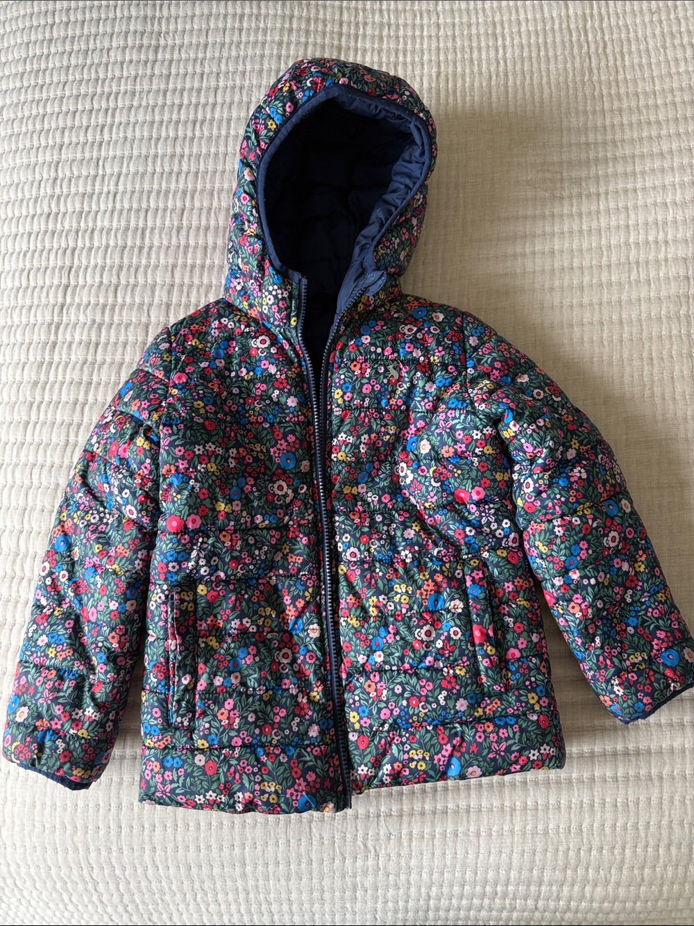 Joules Reversible Navy Floral Hooded Puffer Jacket with Multicolor Flowers